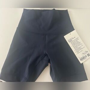 Size 0 
Lululemon Wunder train HR short 6 inch 
navy blue